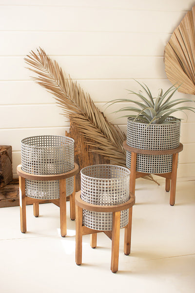 Set Of Three Woven Metal Planters With Wood Stands